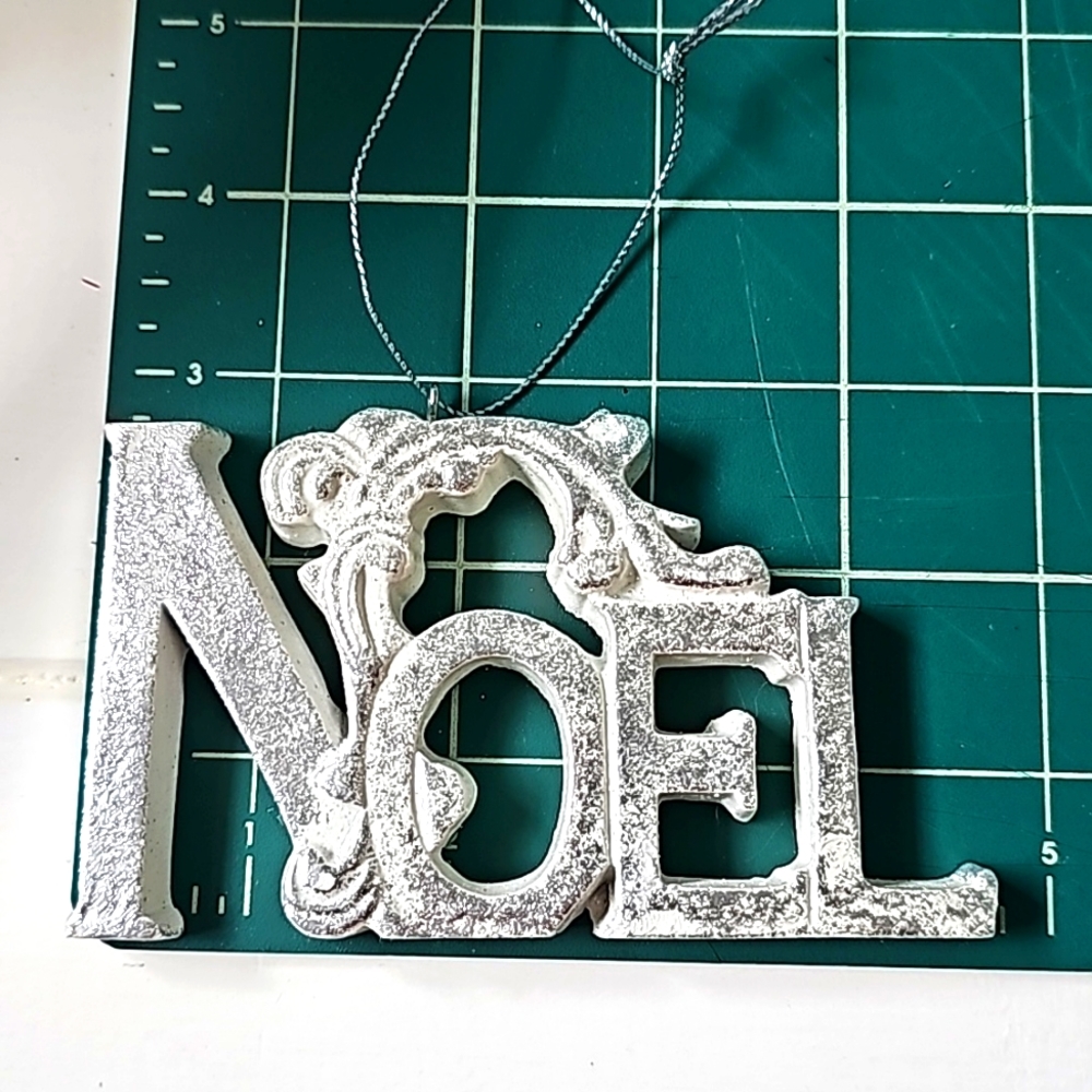 White silver NOEL ornament
